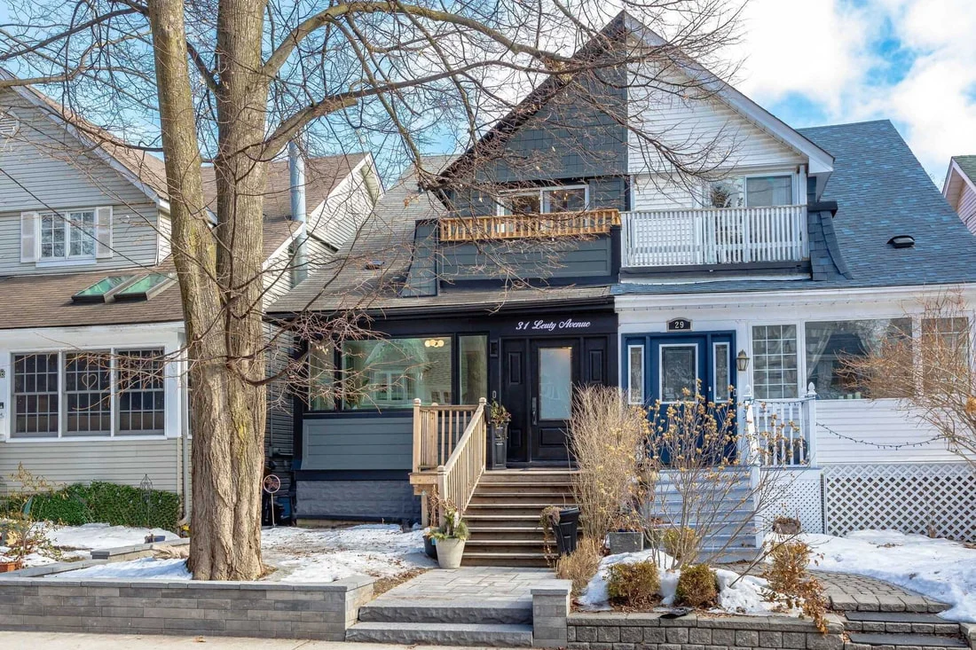 Front exterior of the renovated home at 31 Leuty Avenue